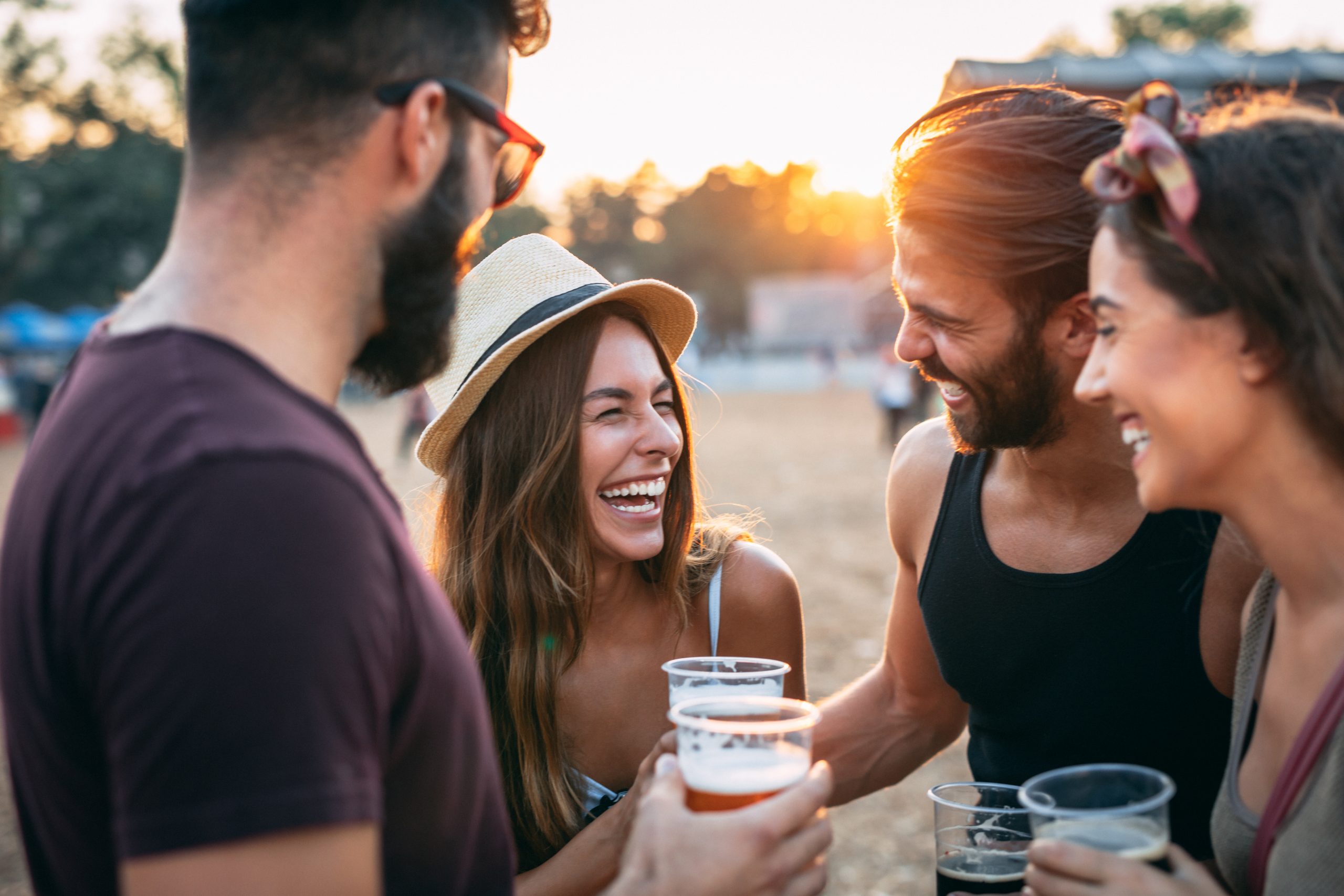 people enjoying a beer together